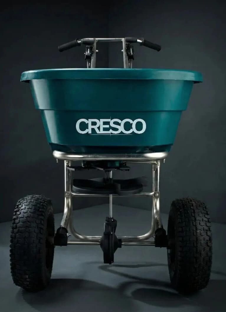 Cresco walk-behind spreader spreading salt